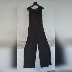 One peace jumpsuit,  black,  Vince Camuto XS, but I am S and fits perfect.